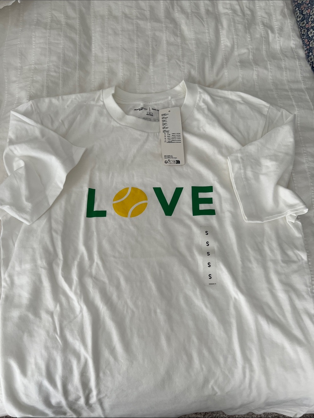 Uniqlo White Tee with Green LOVE Graphic and Yellow Tennis Ball